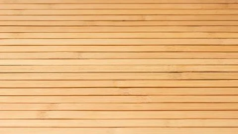 Bamboo boards as a rustic backdrop. High resolution photography. Stock Photos
