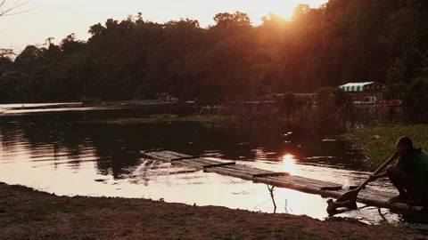 Bamboo boat on the background of the sunset 스톡 동영상 238767904