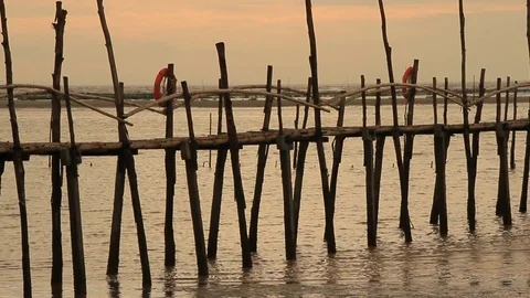 Bamboo bridge on the beach in asian Stock Footage