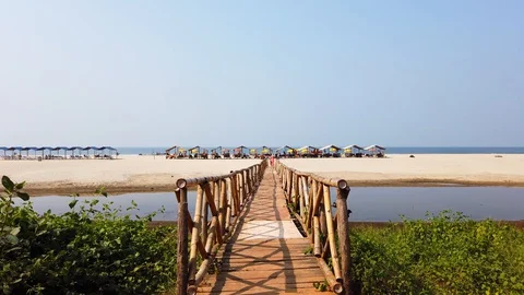 Bamboo bridge over the river Stock Footage 128836966