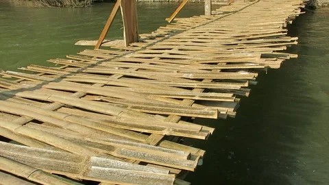 Bamboo Bridge over the stream Stock Footage 103350905