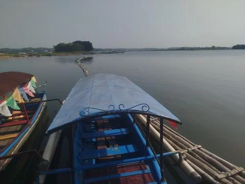 Bamboo bridge over the surface of the lake 写真素材