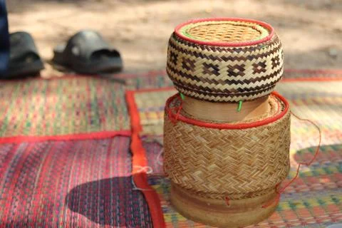 Bamboo container for holding cooked glutinous rice. Stock Photos
