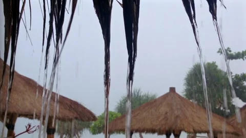 Bamboo hut under a heavy rainy day Stock Footage 304525537