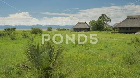 Bamboo huts in Safari landscape in Tanzania Africa Stock Photos