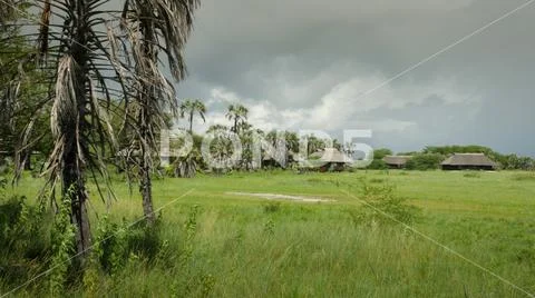 Bamboo huts in Safari landscape in Tanzania Africa Stock Photos