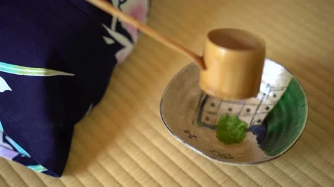 Bamboo ladle adding water to matcha Video stock 131244761