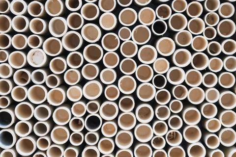 Bamboo pile stacked vertically create texture wall background. Circle in fr.. Stock Photos