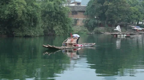 Bamboo raft driver Stock Footage 58086650