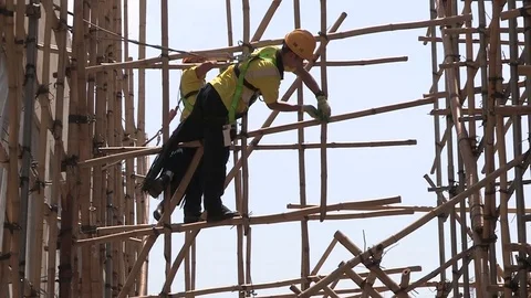 Bamboo scaffolding under construction Stock Footage