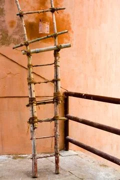 Bamboo stair at wall 스톡 사진
