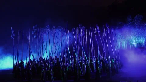 Bamboo sticks circle act in Impression DaHongPao show, Wuyishan, China Video stock 277736771