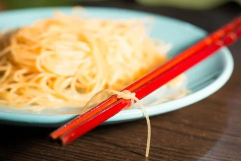 Bamboo sticks tied with a knot of rice noodles Stock Photos