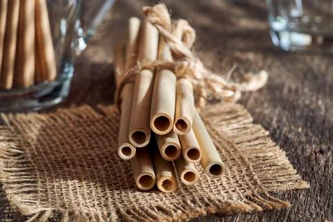 Bamboo straws on a table - zero-waste or ecology concept Stock Photos
