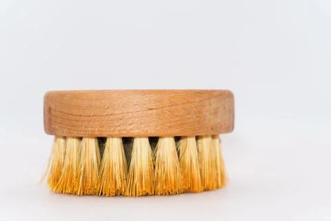 A bamboo thread beard comb with a wooden base, an old beard comb with dust and Stock Photos