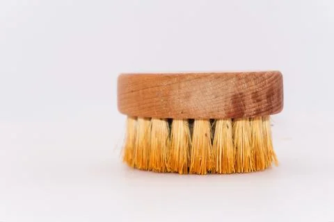 A bamboo thread beard comb with a wooden base, an old beard comb with dust and Stock Photos