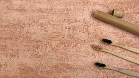 Bamboo toothbrush demonstration with copy space for text Stock Footage 112927190
