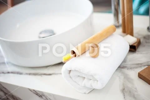 Bamboo toothbrushes on a shelf in the bathroom. Zero waste, eco, save planet Stock Photos