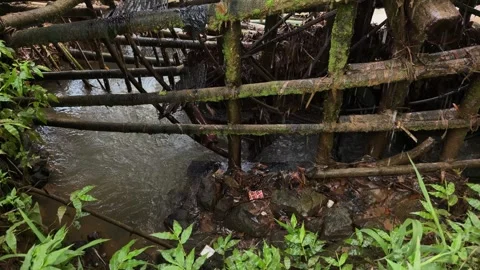 Bamboo waterwheel architecture rotating down to scoop water. Stock-Footage 341482791