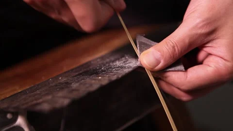Bamboo weaving artisans perform scraping treatment on bamboo strips Stock Footage 278302124