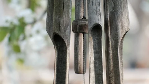 Bamboo wind chimes hung outside Stock Footage 122011973