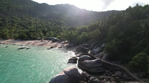 Bambu huts on Koh Phangan, Best parties are happening on the rocks on the beach Stock Footage 310775639