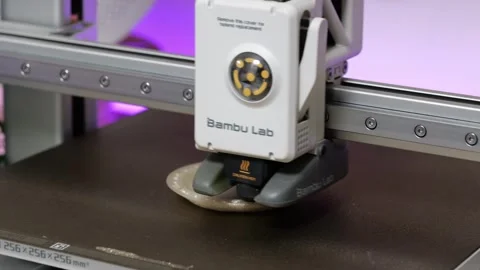 Bambu Lab A1 3D printer print head extruding filament Stock-Footage 344275016
