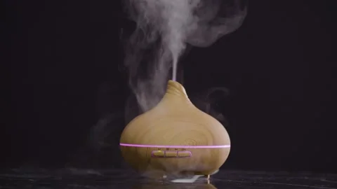 Bambus-humidifier-Diffuser-black-table-black-background Stock Footage 149037619