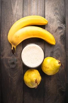 Banana and pear smoothie Stock Photos