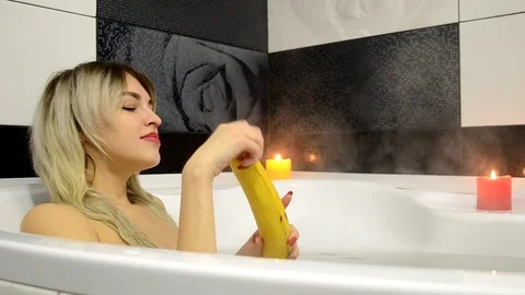 Banana in bath Stock Footage 101399666