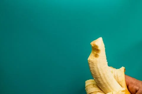 Banana on a blue background Stock Photos