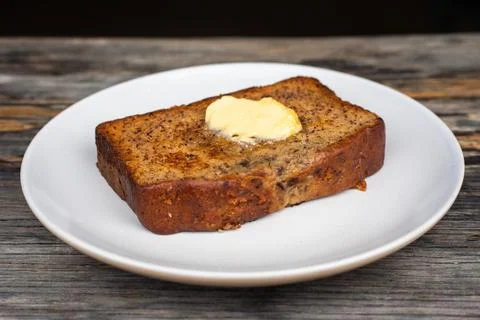 Banana Bread with butter Stock Photos