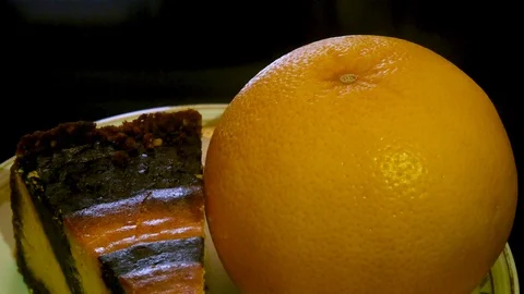 Banana cheesecake and fresh grapefruit lying on the glass table Stock Footage 104195341