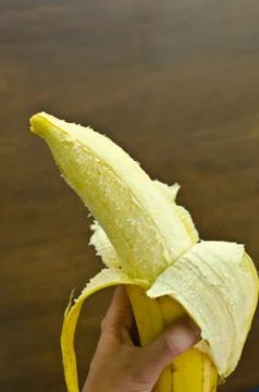 A banana in hand Stock Photos