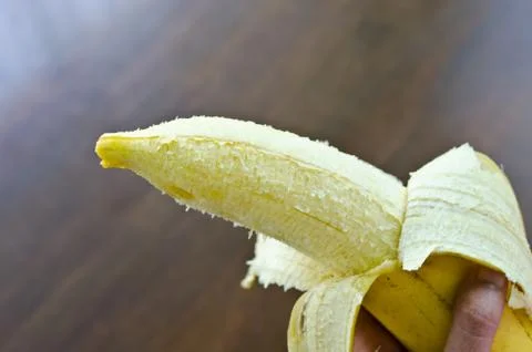 A banana in hand Stock Photos