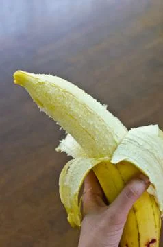 A banana in hand Stock Photos