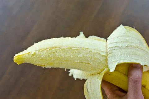 A banana in hand Stock Photos