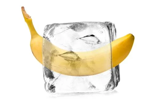 Banana in ice cube Stock Photos