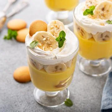 Banana pudding in small glasses Stock Photos