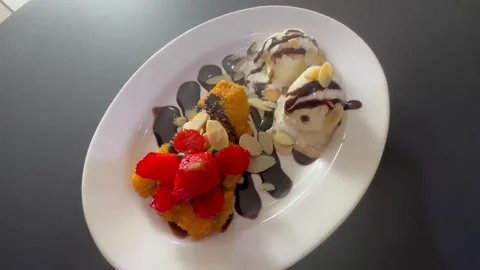Banana split on a table Stock Footage 277596619