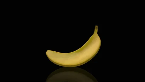 Banana turns on itself centered Stock Footage 238547217