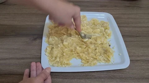 Bananas Are Crushed With Fork Video stock 157825558