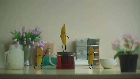 Bananas are dancing on a table seamless loop 3D render animation Stock Footage 127372100
