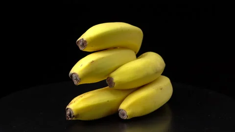 Bananas on a black background close-up. Stock Footage 147678455
