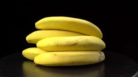 Bananas on a black background close-up. Stock Footage 147723628