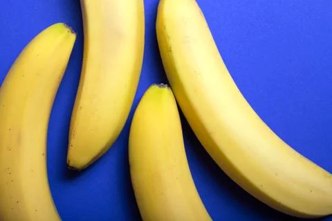Bananas on a blue background Stock Photos