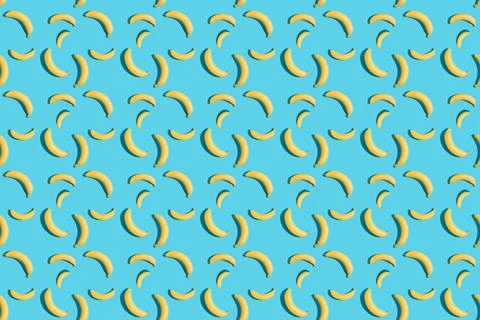Bananas on a blue background. Seamless banana pattern. Seamless texture. Hard Stock Illustration