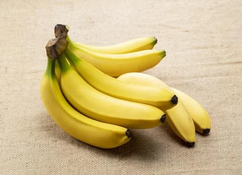 Bananas on a burlap background Stock Photos