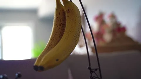 Bananas hanging Stock Footage 134958992
