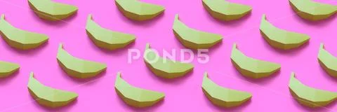 Bananas made of paper pattern on pink pastel background. Stock Photos